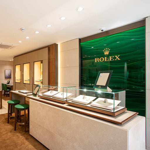 The Michael Spiers store in Truro. The Rolex counter is visible on the right hand side with Rolex watches on display in glass cabinets.