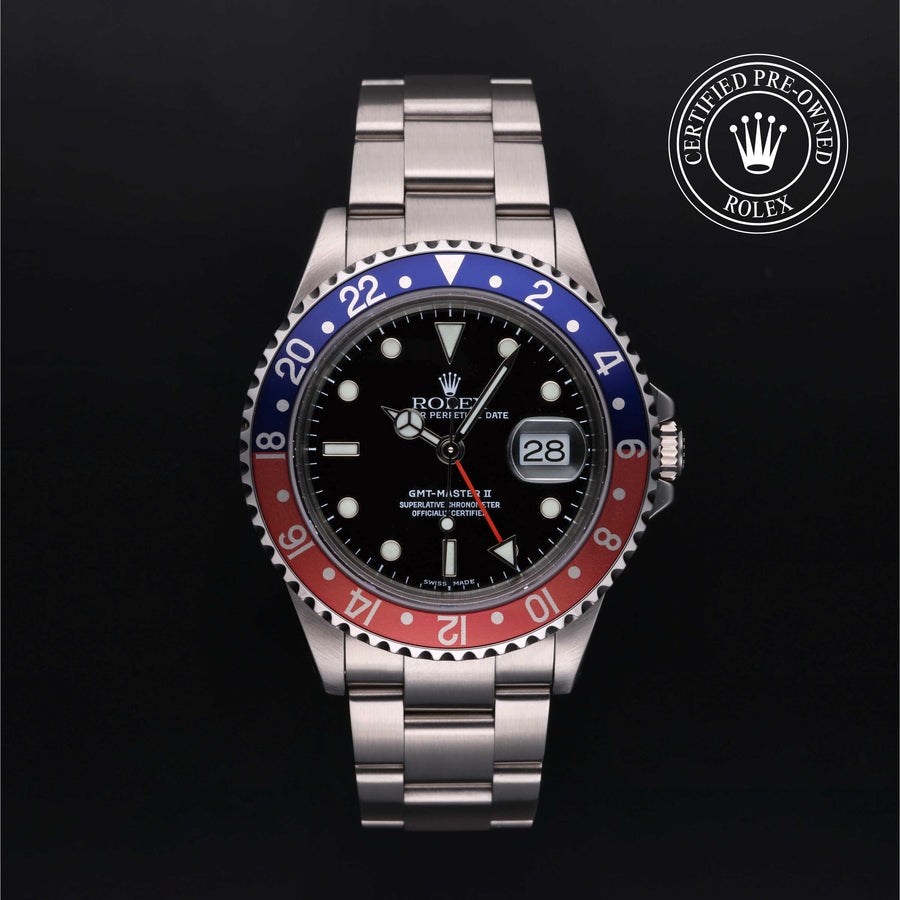 A Rolex Submariner Date watch with a stainless steel Oyster bracelet and a distinctive blue and red ceramic bezel, shown against a dark background with a 'Certified Pre-Owned Rolex' emblem in the top right corner.