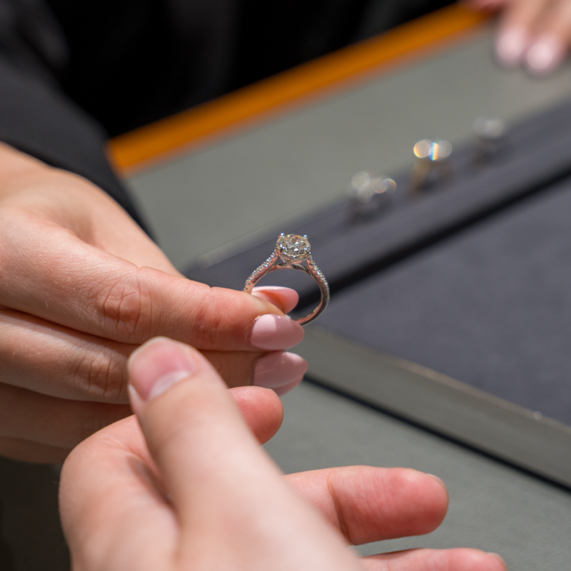 Handing over Michael Spiers Engagement Ring