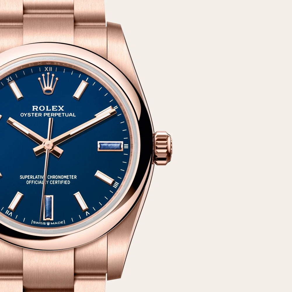 Rolex Oyster Perpetual 34 in 18 ct Everose gold with a Blue stone dial, Domed bezel, Oyster, three-piece solid links bracelet