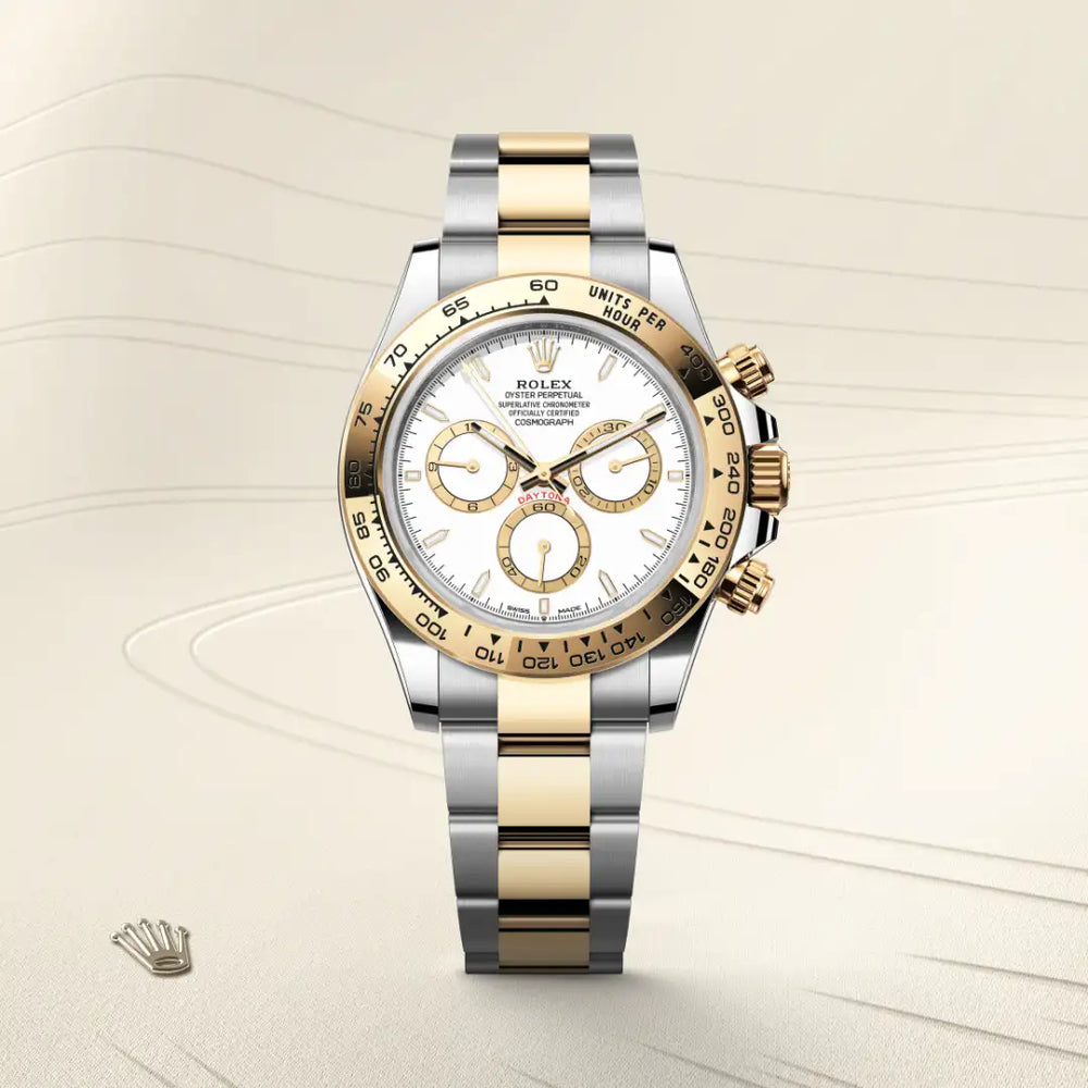 Rolex Cosmograph Daytona in Yellow Rolesor - combination of Oystersteel and yellow gold with a White, golden counter rings dial, Fixed, with engraved tachymetric scale, in yellow gold bezel, Oyster, three-piece solid links bracelet