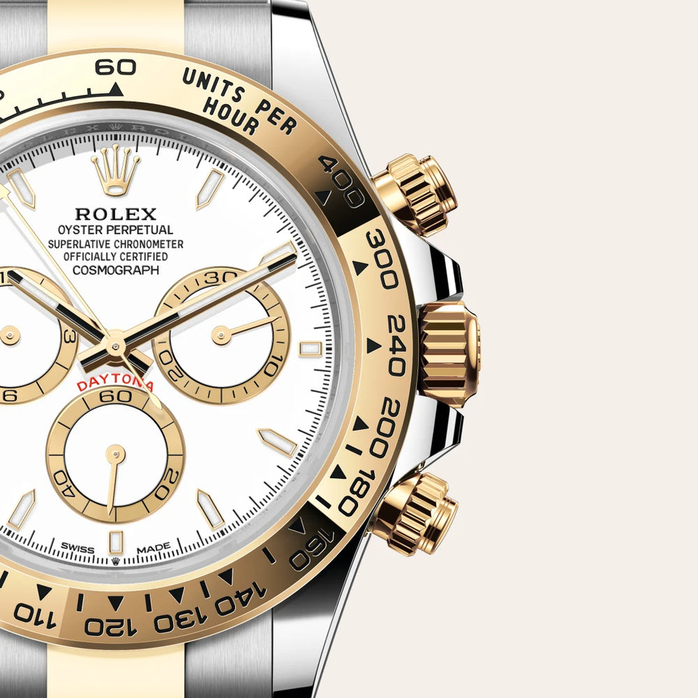 Rolex Cosmograph Daytona in Yellow Rolesor - combination of Oystersteel and yellow gold with a White, golden counter rings dial, Fixed, with engraved tachymetric scale, in yellow gold bezel, Oyster, three-piece solid links bracelet