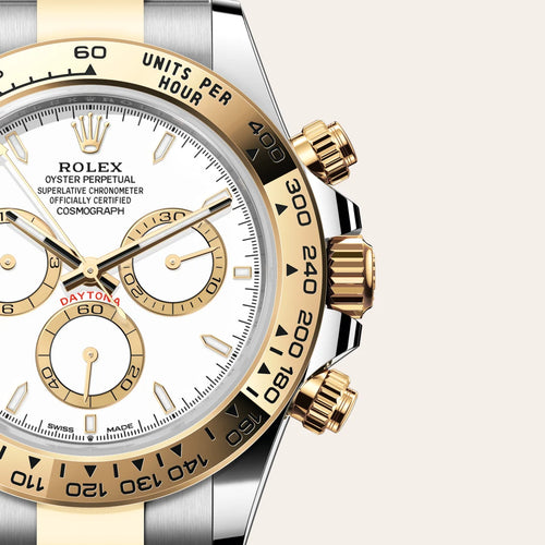 Rolex Cosmograph Daytona in Yellow Rolesor - combination of Oystersteel and yellow gold with a White, golden counter rings dial, Fixed, with engraved tachymetric scale, in yellow gold bezel, Oyster, three-piece solid links bracelet