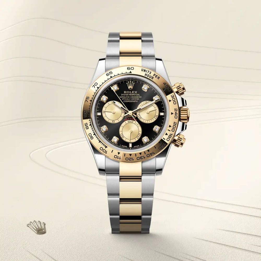Rolex Cosmograph Daytona in Yellow Rolesor - combination of Oystersteel and yellow gold with a Bright black and golden set with diamonds dial, Fixed, with engraved tachymetric scale, in yellow gold bezel, Oyster, three-piece solid links bracelet