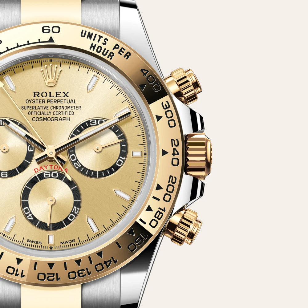 Rolex Cosmograph Daytona in Yellow Rolesor - combination of Oystersteel and yellow gold with a Golden, black counter rings dial, Fixed, with engraved tachymetric scale, in yellow gold bezel, Oyster, three-piece solid links bracelet
