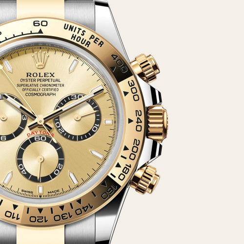 Rolex Cosmograph Daytona in Yellow Rolesor - combination of Oystersteel and yellow gold with a Golden, black counter rings dial, Fixed, with engraved tachymetric scale, in yellow gold bezel, Oyster, three-piece solid links bracelet