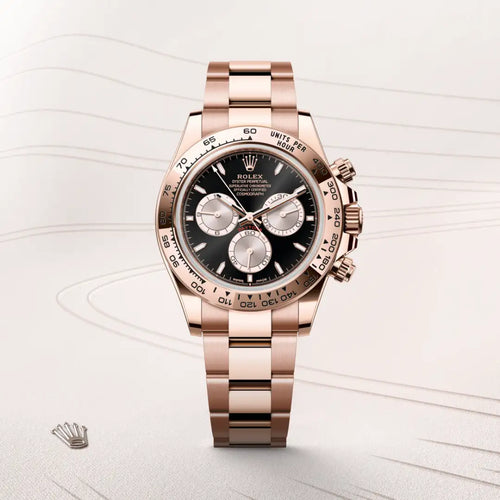 Rolex Cosmograph Daytona in 18 ct Everose gold with a Bright black and Sundust dial, Fixed, with engraved tachymetric scale, in 18 ct Everose gold bezel, Oyster, three-piece solid links bracelet