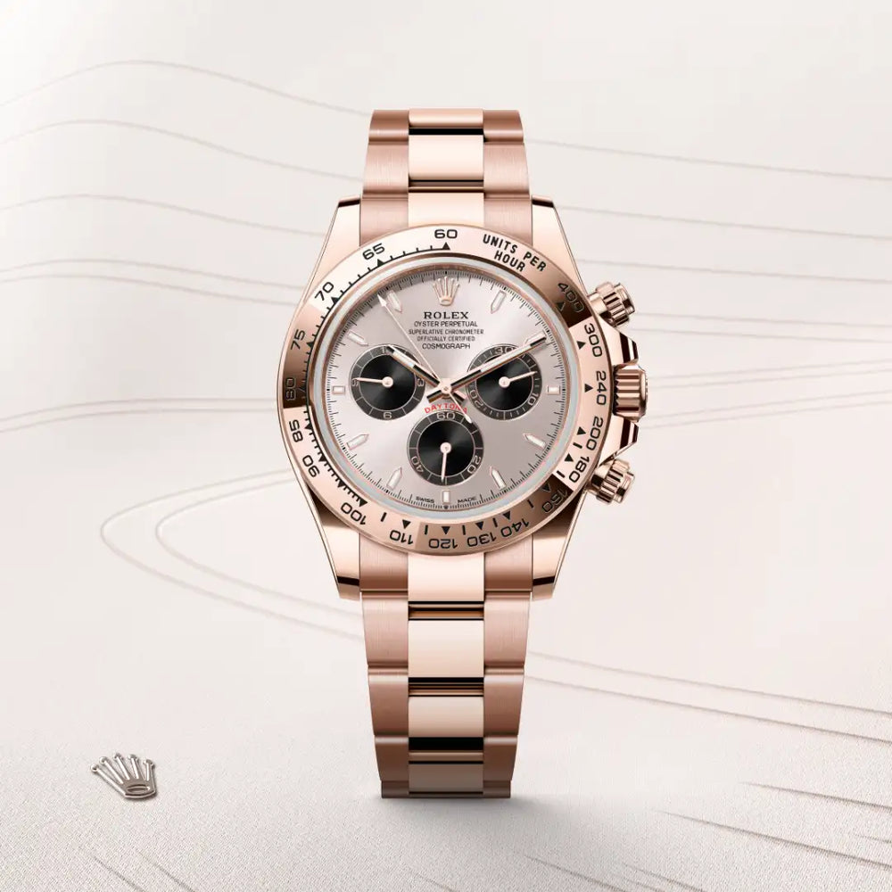 Rolex Cosmograph Daytona in 18 ct Everose gold with a Sundust and bright black dial, Fixed, with engraved tachymetric scale, in 18 ct Everose gold bezel, Oyster, three-piece solid links bracelet