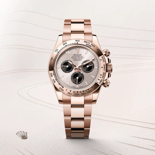 Rolex Cosmograph Daytona in 18 ct Everose gold with a Sundust and bright black dial, Fixed, with engraved tachymetric scale, in 18 ct Everose gold bezel, Oyster, three-piece solid links bracelet
