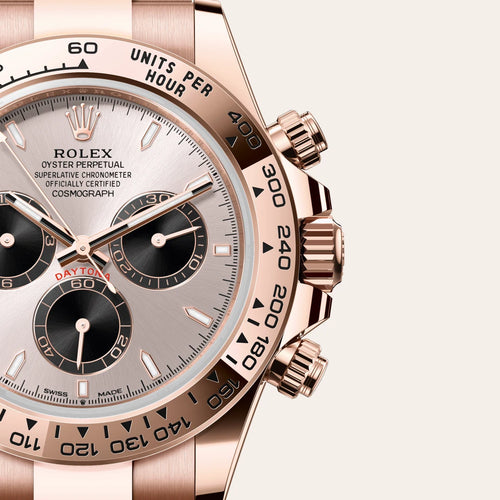 Rolex Cosmograph Daytona in 18 ct Everose gold with a Sundust and bright black dial, Fixed, with engraved tachymetric scale, in 18 ct Everose gold bezel, Oyster, three-piece solid links bracelet