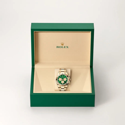 Rolex Cosmograph Daytona in 18 ct yellow gold with a Bright green and golden dial, Fixed, with engraved tachymetric scale, in 18 ct yellow gold bezel, Oyster, three-piece solid links bracelet