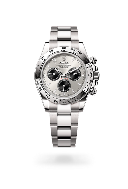 Rolex Cosmograph Daytona in 18 ct white gold with a Steel and bright black dial, Fixed, with engraved tachymetric scale, in 18 ct white gold bezel, Oyster, three-piece solid links bracelet