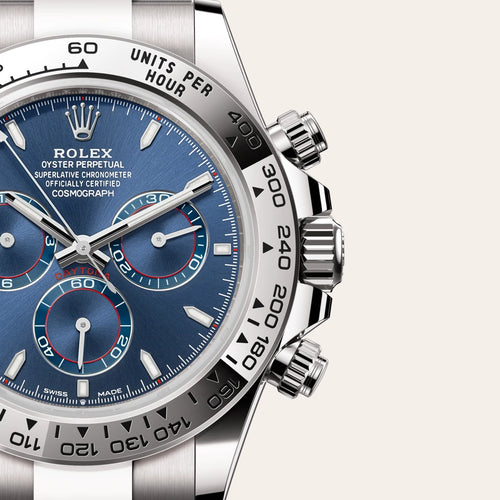 Rolex Cosmograph Daytona in 18 ct white gold with a Bright blue dial, Fixed, with engraved tachymetric scale, in 18 ct white gold bezel, Oyster, three-piece solid links bracelet