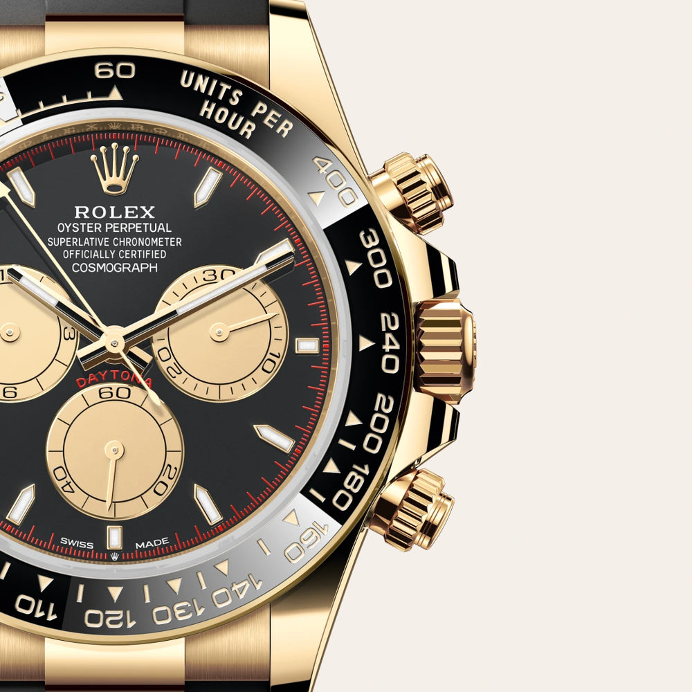 Rolex Cosmograph Daytona in 18 ct yellow gold with a Intense black and champagne-colour dial, Black monobloc Cerachrom bezel in ceramic with moulded tachymetric scale bezel, Oysterflex bracelet