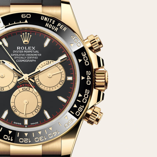Rolex Cosmograph Daytona in 18 ct yellow gold with a Intense black and champagne-colour dial, Black monobloc Cerachrom bezel in ceramic with moulded tachymetric scale bezel, Oysterflex bracelet