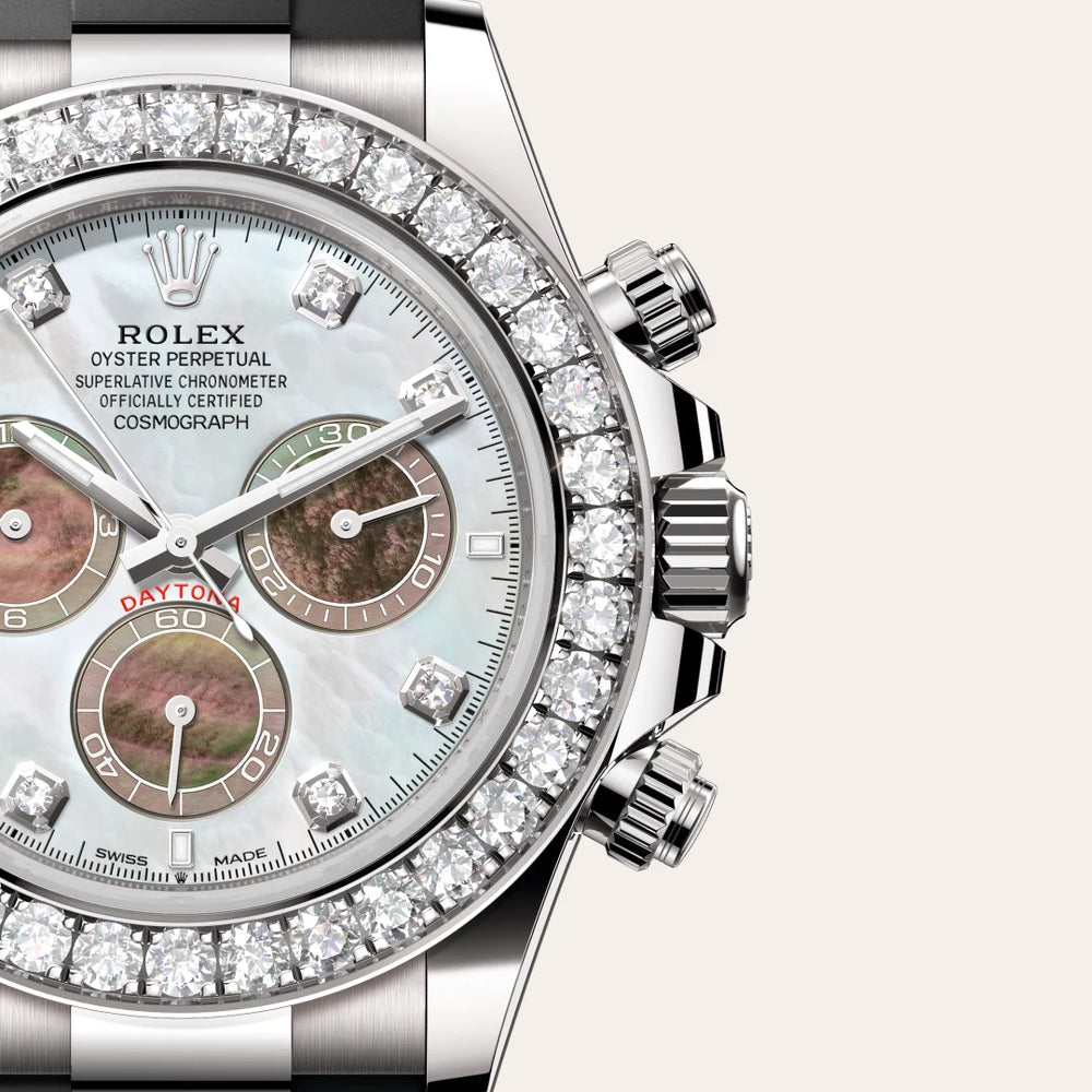 Rolex Cosmograph Daytona in 18 ct white gold with a White and black mother-of-pearl set with diamonds dial, Set with diamonds bezel, Oysterflex bracelet