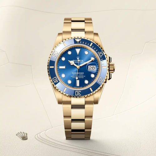 Rolex Submariner Date in 18 ct yellow gold with a Royal blue dial, Unidirectional rotatable 60-minute graduated, scratch-resistant Cerachrom insert in blue ceramic, numerals and graduations coated in gold bezel, Oyster, three-piece solid links bracelet