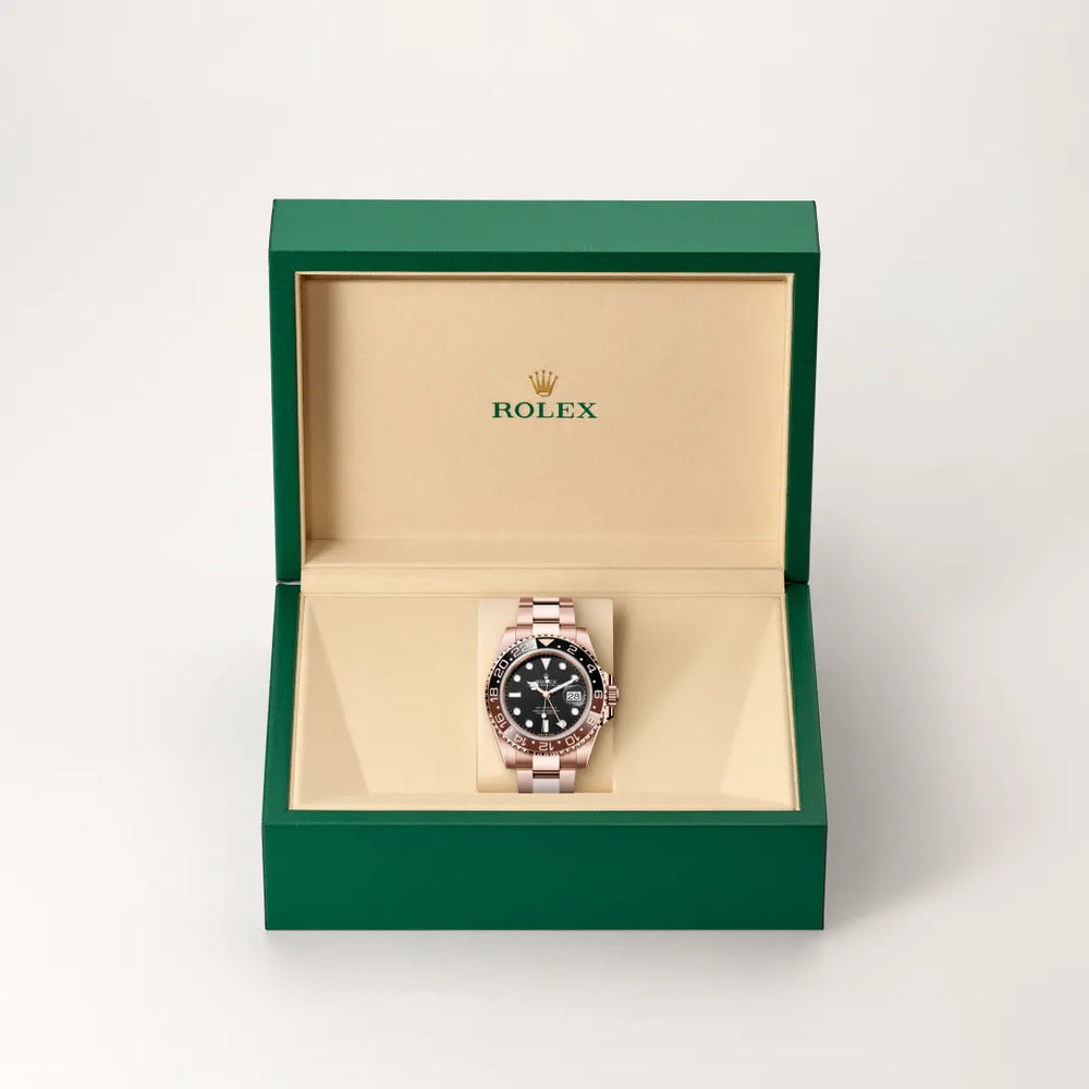 Rolex GMT-Master II in 18 ct Everose gold with a Black dial, Bidirectional rotatable 24-hour graduated bezel. Two-colour brown and black Cerachrom insert in ceramic, moulded numerals and graduations bezel, Oyster, three-piece solid links bracelet