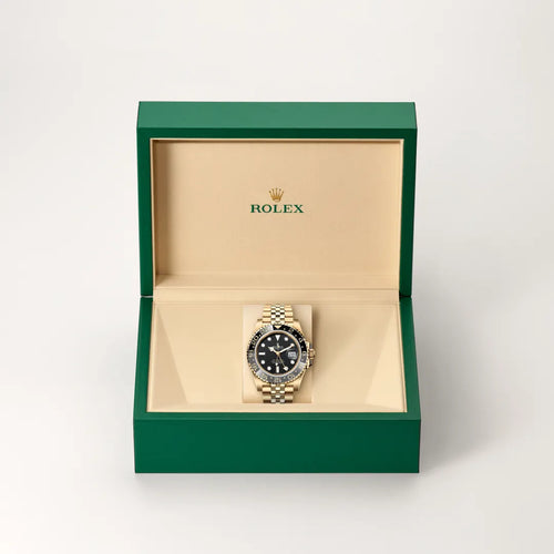 Rolex GMT-Master II in 18 ct yellow gold with a Black dial, Bidirectional rotatable 24-hour graduated bezel. Two-colour grey and black Cerachrom insert in ceramic, moulded numerals and graduations bezel, Jubilee, five-piece links bracelet