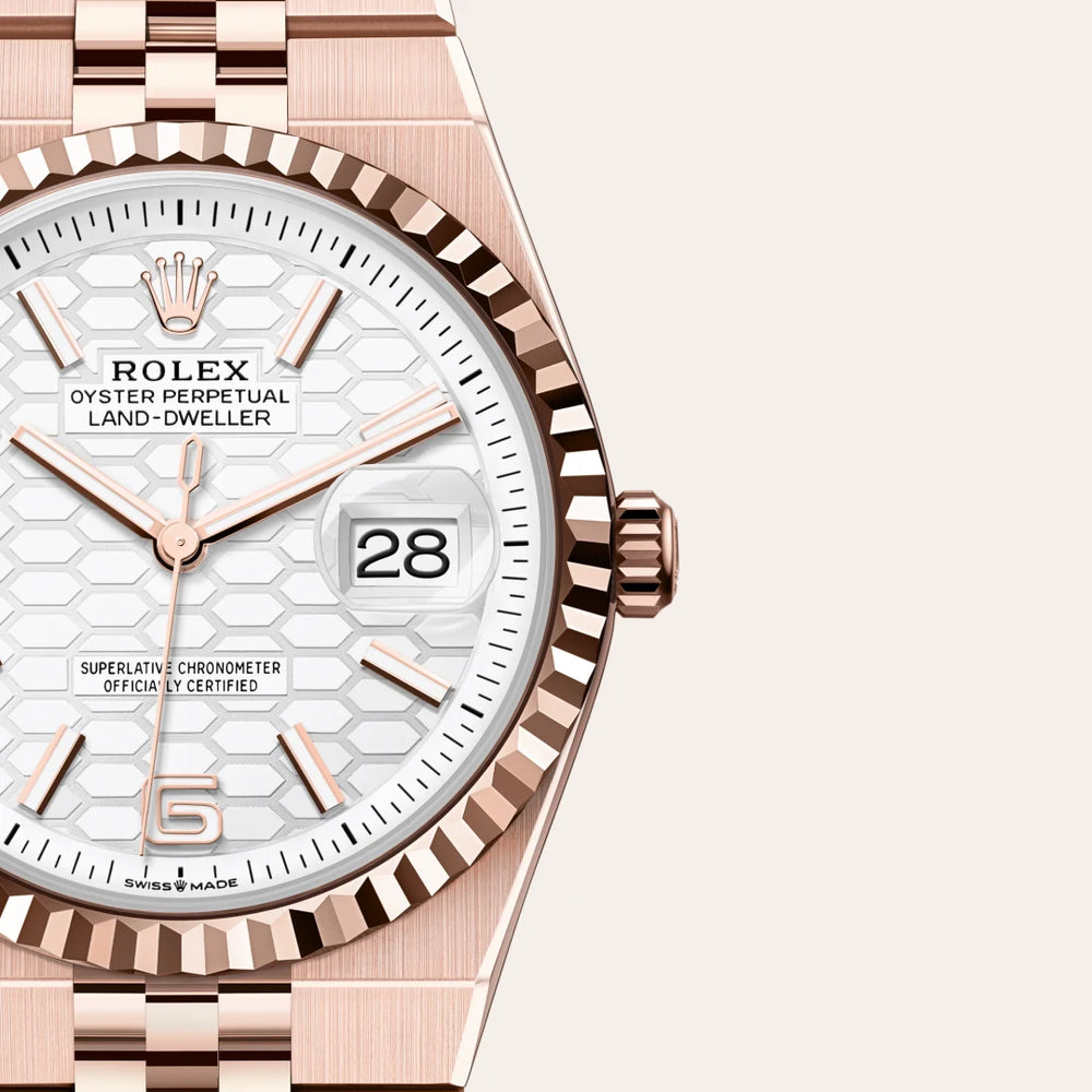 Rolex Land-Dweller 36 in 18 ct Everose gold with a Intense white, honeycomb motif dial, Fluted bezel, Flat Jubilee, five-piece solid links bracelet