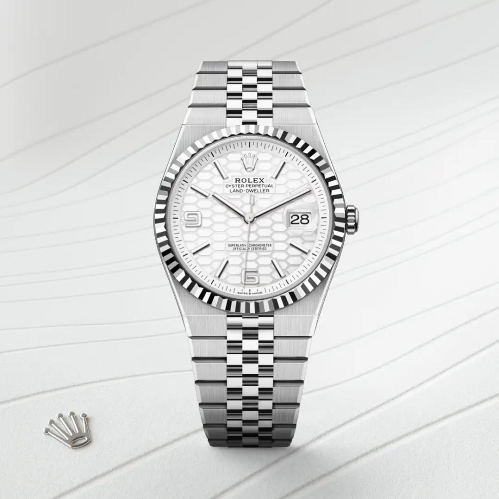 Rolex Land-Dweller 40 in White Rolesor - combination of Oystersteel and white gold with a Intense white, honeycomb motif dial, Fluted bezel, Flat Jubilee, five-piece solid links bracelet