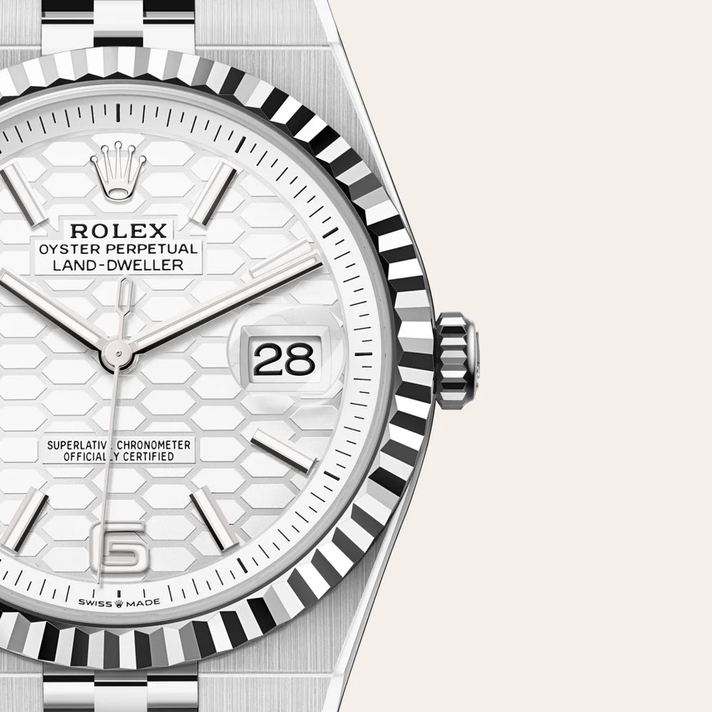 Rolex Land-Dweller 40 in White Rolesor - combination of Oystersteel and white gold with a Intense white, honeycomb motif dial, Fluted bezel, Flat Jubilee, five-piece solid links bracelet