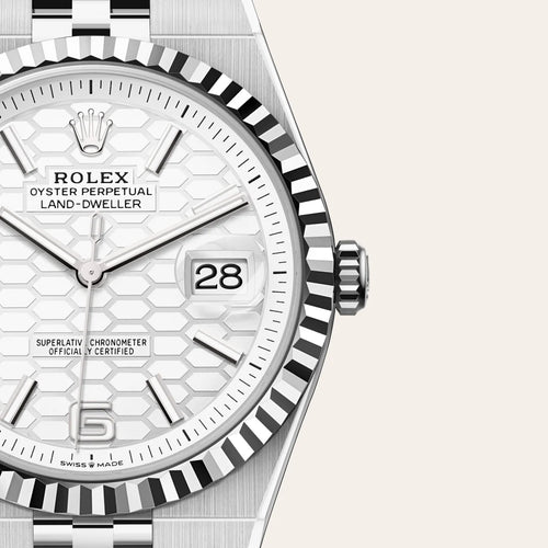 Rolex Land-Dweller 40 in White Rolesor - combination of Oystersteel and white gold with a Intense white, honeycomb motif dial, Fluted bezel, Flat Jubilee, five-piece solid links bracelet