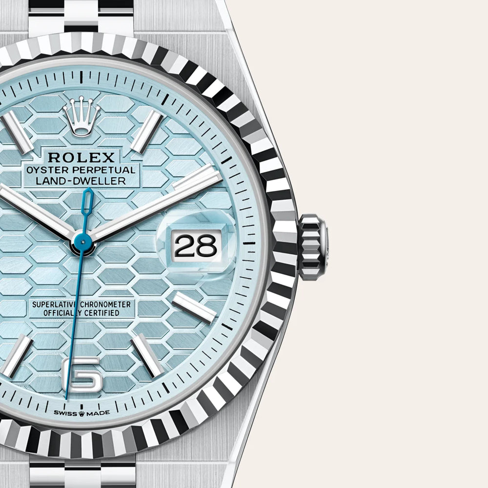 Rolex Land-Dweller 40 in Platinum with a Ice blue, honeycomb motif dial, Fluted bezel, Flat Jubilee, five-piece solid links bracelet