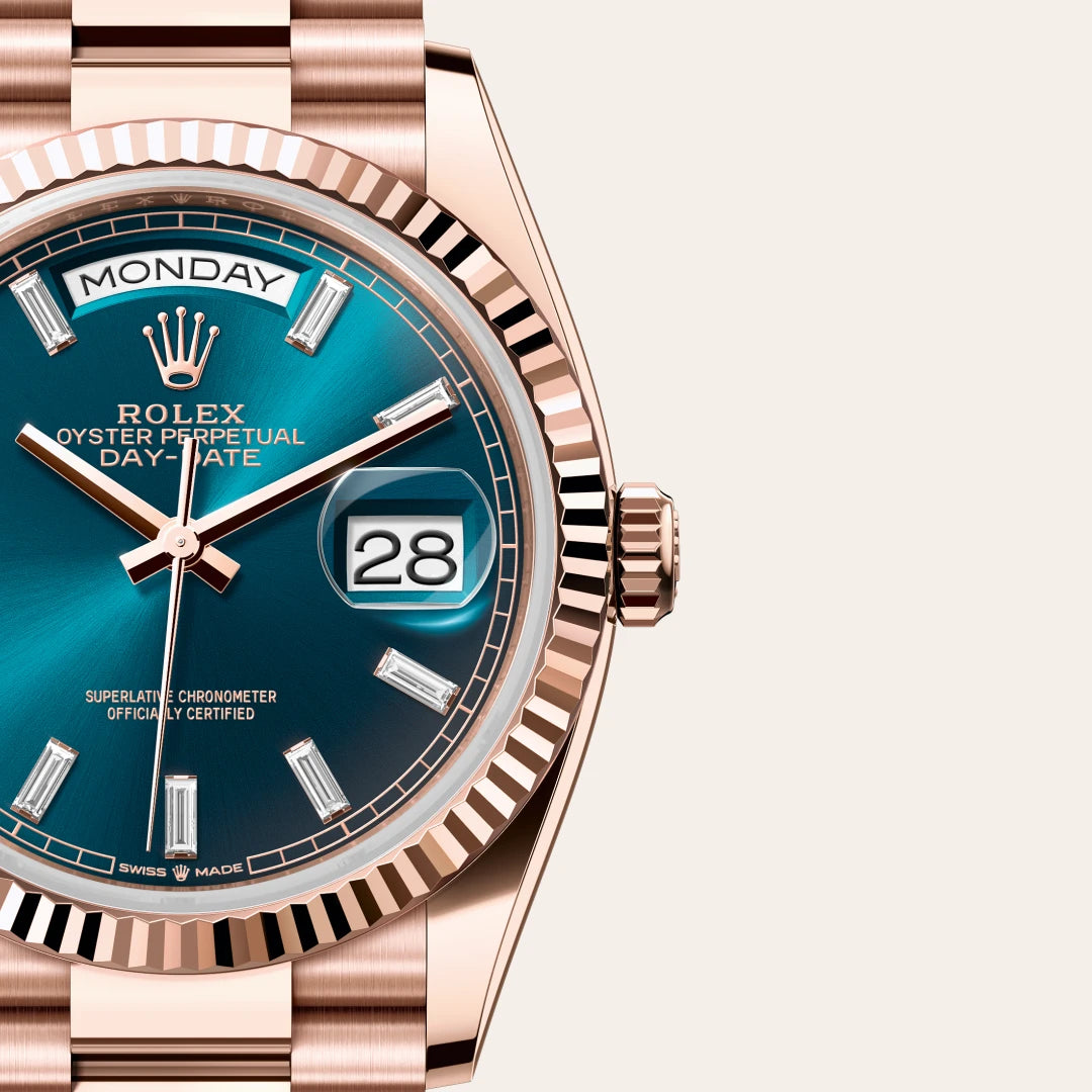 Rolex Day-Date 36 in 18 ct Everose gold with a Blue-green set with diamonds dial, Fluted bezel, President, semi-circular three-piece links bracelet