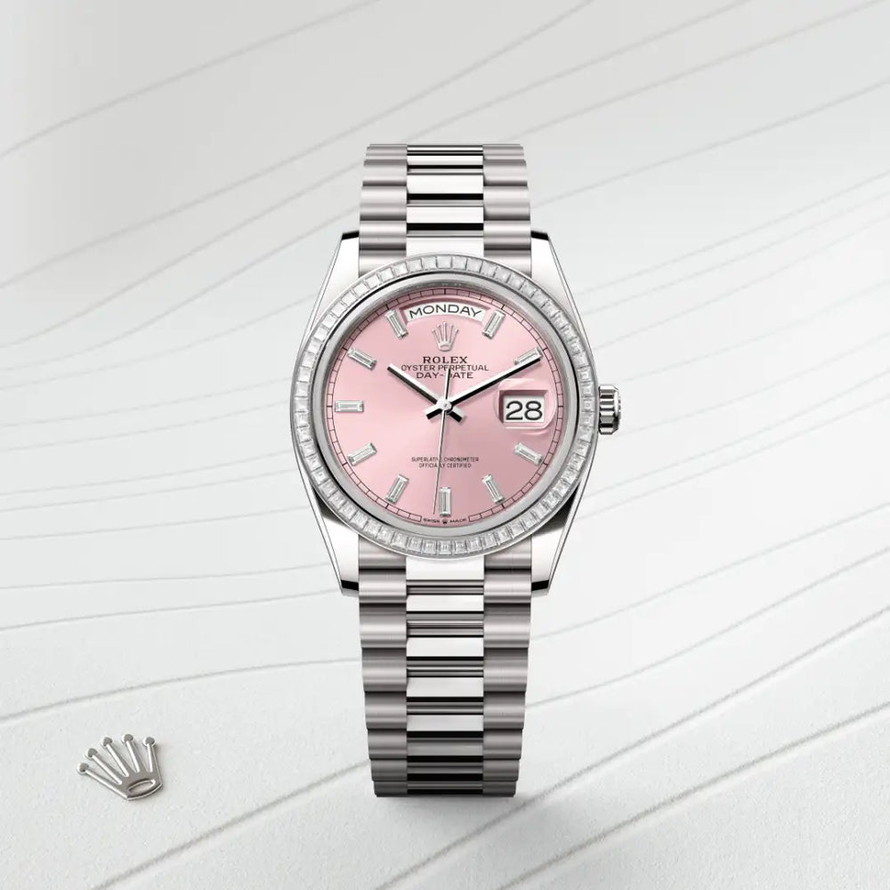 Rolex Day-Date 36 in 18 ct white gold with a Pink set with diamonds dial, Set with diamonds bezel, President, semi-circular three-piece links bracelet