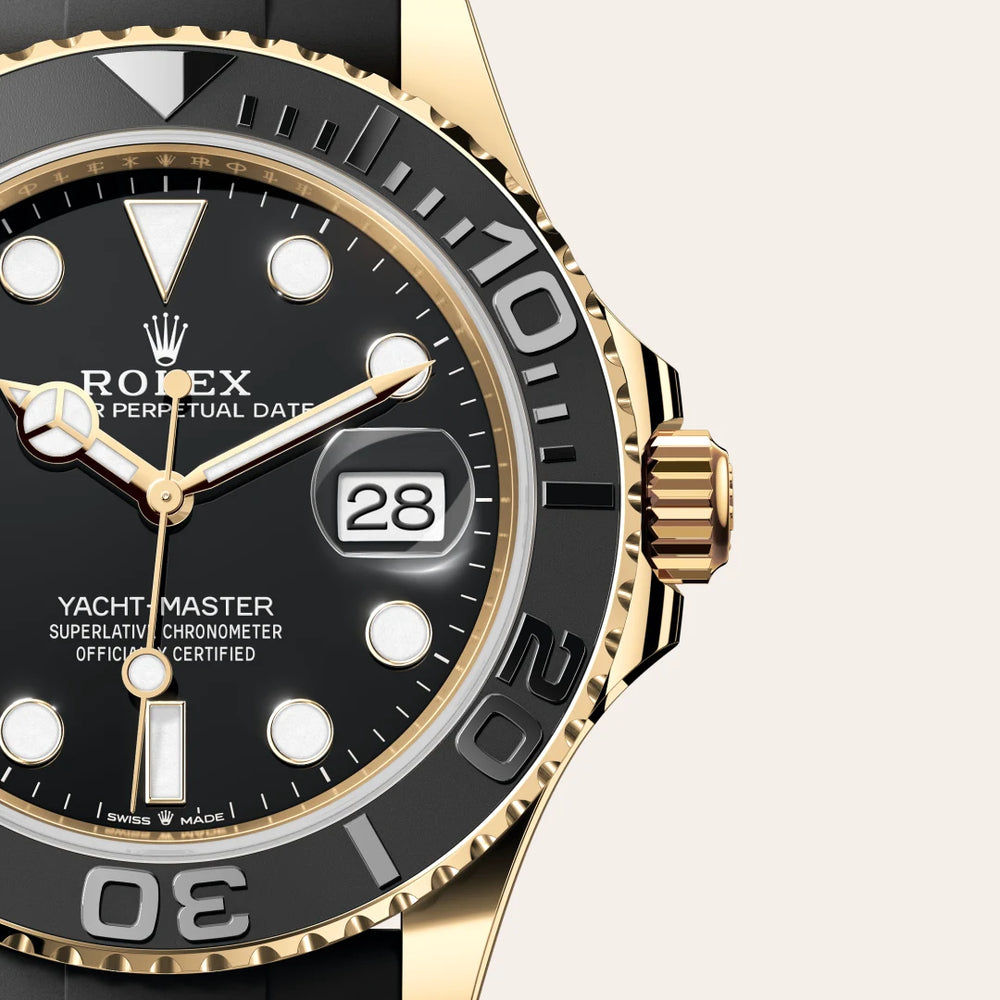 Rolex Yacht-Master 42 in 18 ct yellow gold with a Black dial, Bidirectional rotatable 60-minute graduated bezel with matt black Cerachrom insert in ceramic, polished raised numerals and graduations bezel, Oysterflex bracelet