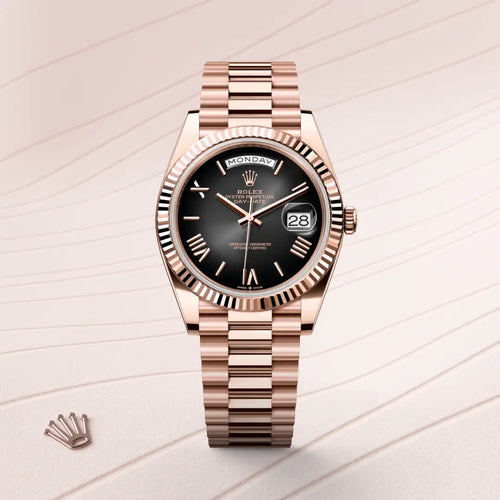 Rolex Day-Date 40 in 18 ct Everose gold with a Slate ombré dial, Fluted bezel, President, semi-circular three-piece links bracelet