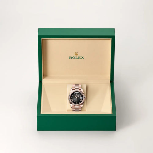 Rolex Day-Date 40 in 18 ct Everose gold with a Slate ombré dial, Fluted bezel, President, semi-circular three-piece links bracelet