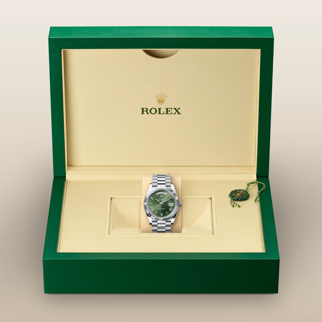 Rolex Day-Date 40 in Platinum with a Olive green dial, Fluted bezel, President, semi-circular three-piece links bracelet