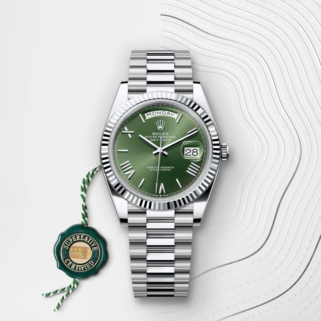 Rolex Day-Date 40 in Platinum with a Olive green dial, Fluted bezel, President, semi-circular three-piece links bracelet