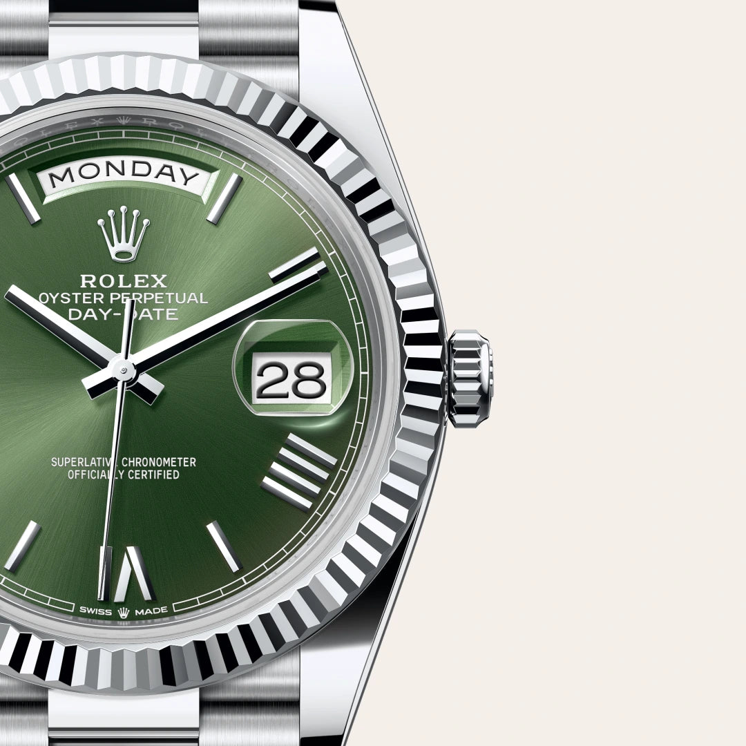 Rolex Day-Date 40 in Platinum with a Olive green dial, Fluted bezel, President, semi-circular three-piece links bracelet