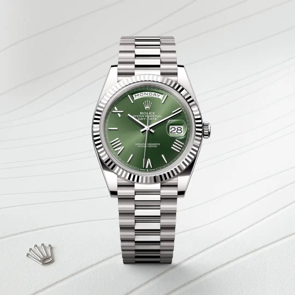 Rolex Day-Date 40 in 18 ct white gold with a Olive green dial, Fluted bezel, President, semi-circular three-piece links bracelet