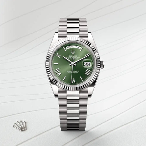 Rolex Day-Date 40 in 18 ct white gold with a Olive green dial, Fluted bezel, President, semi-circular three-piece links bracelet