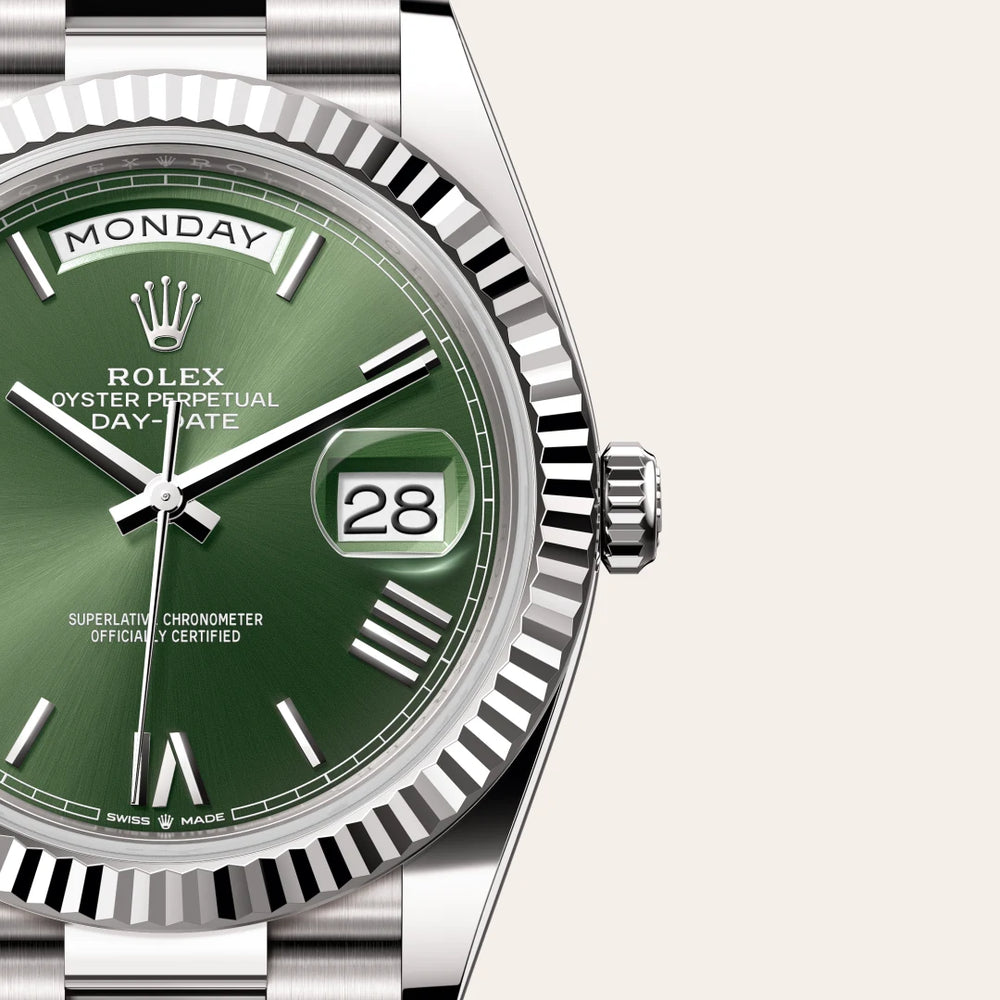 Rolex Day-Date 40 in 18 ct white gold with a Olive green dial, Fluted bezel, President, semi-circular three-piece links bracelet