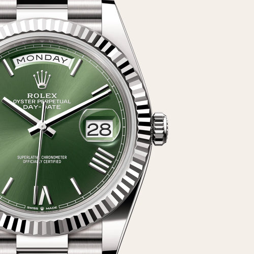 Rolex Day-Date 40 in 18 ct white gold with a Olive green dial, Fluted bezel, President, semi-circular three-piece links bracelet