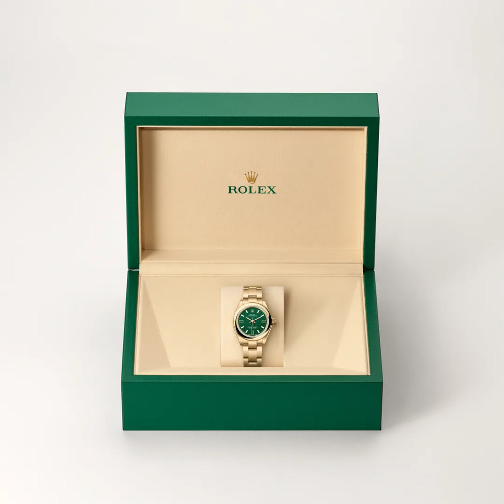 Rolex Oyster Perpetual 28 in 18 ct yellow gold with a Green stone dial, Domed bezel, Oyster, three-piece solid links bracelet