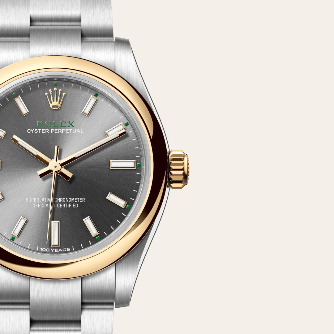 Rolex Oyster Perpetual 31 in Yellow Rolesor - combination of Oystersteel and yellow gold with a Slate dial, Domed bezel, Oyster, three-piece solid links bracelet