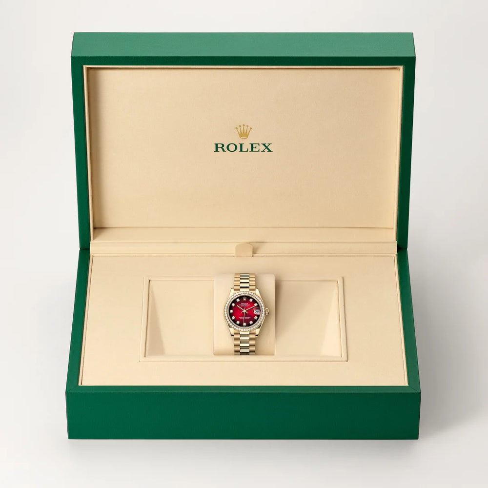 Rolex Datejust 31 in 18 ct yellow gold with a Red ombré set with diamonds dial, Diamond-set bezel, President, semi-circular three-piece links bracelet