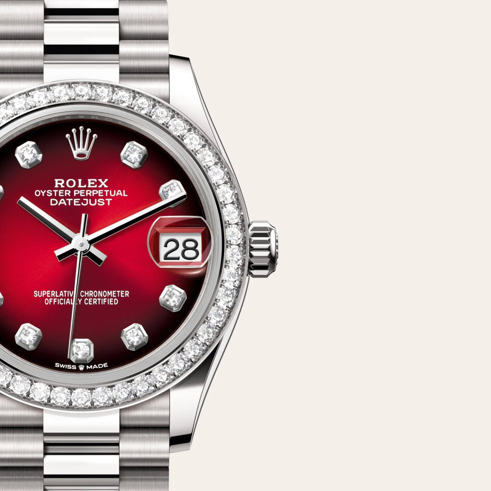 Rolex Datejust 31 in 18 ct white gold with a Red ombré set with diamonds dial, Diamond-set bezel, President, semi-circular three-piece links bracelet