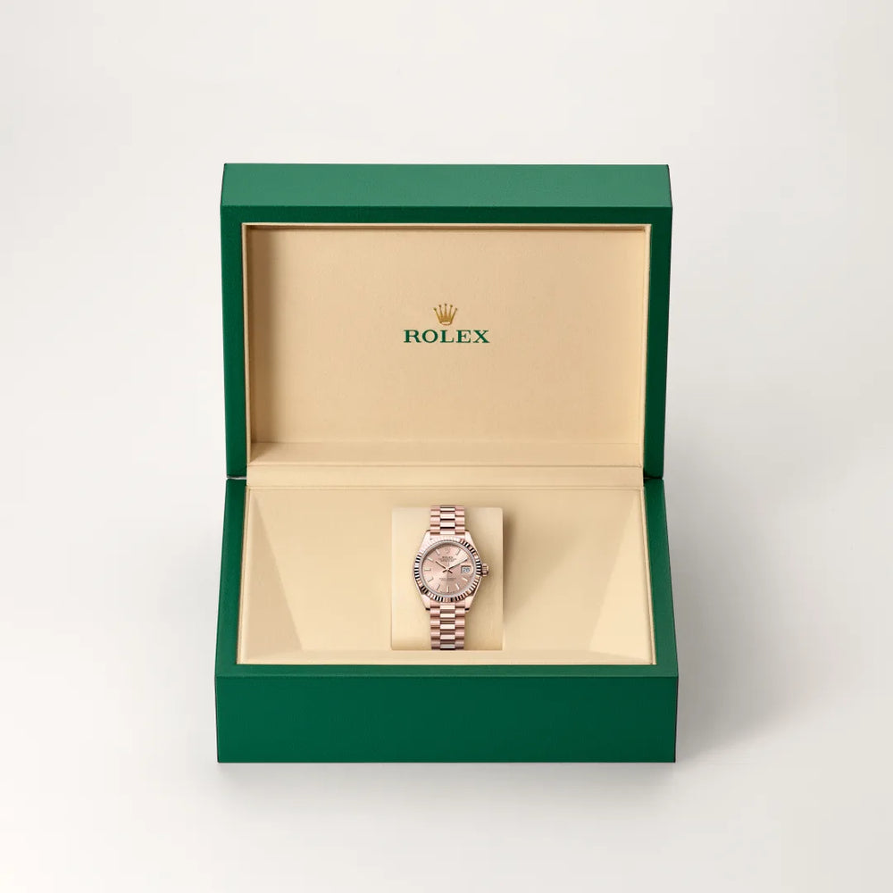Rolex Lady-Datejust in 18 ct Everose gold with a Rosé-colour dial, Fluted bezel, President, semi-circular three-piece links bracelet