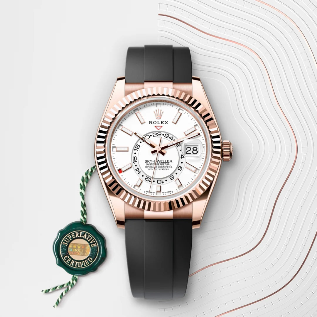 Rolex Sky-Dweller in 18 ct Everose gold with a Intense white dial, Fluted, bidirectional rotatable Rolex Ring Command bezel, Oysterflex bracelet