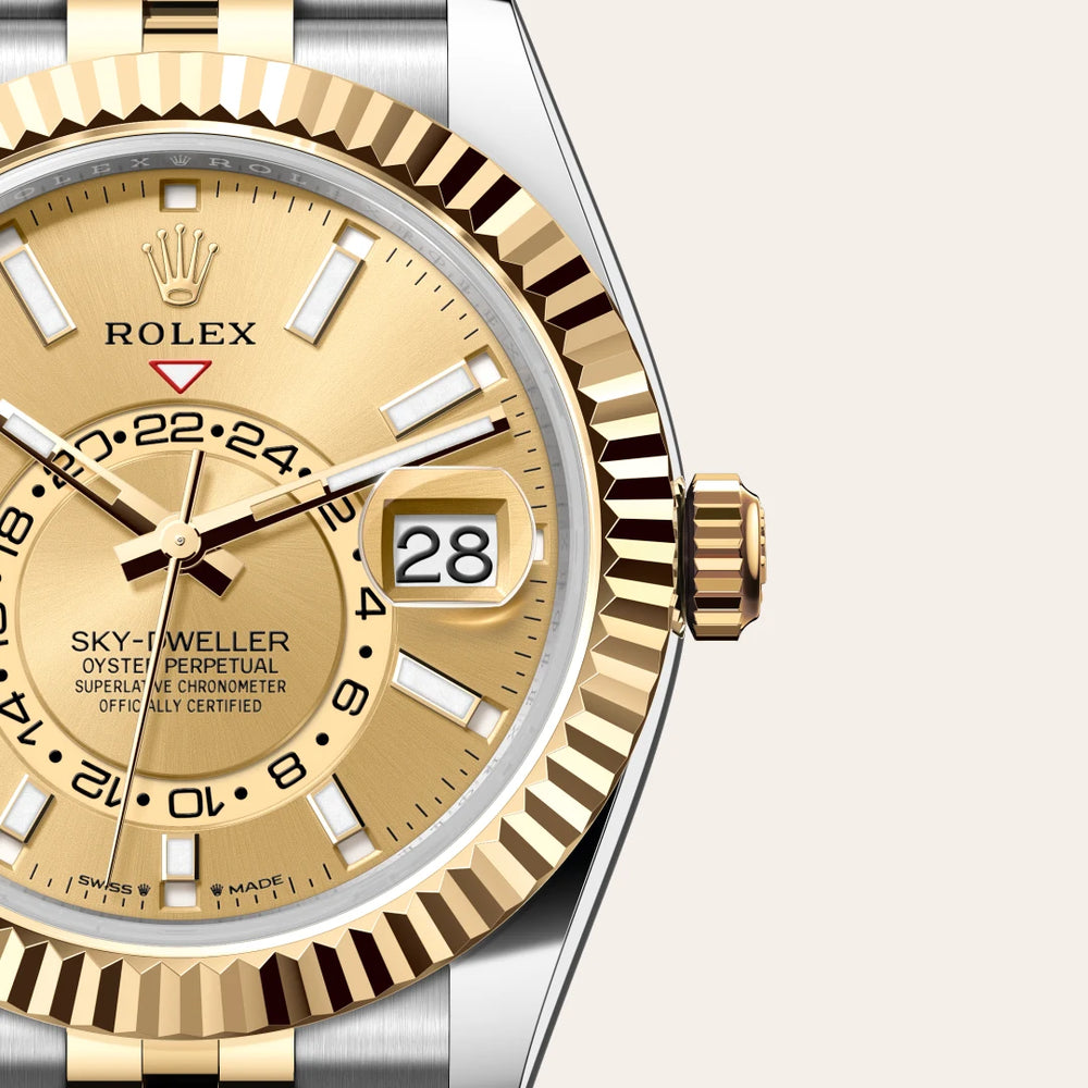 Rolex Sky-Dweller in Yellow Rolesor - combination of Oystersteel and yellow gold with a Champagne-colour dial, Fluted, bidirectional rotatable Rolex Ring Command bezel, Jubilee, five-piece links bracelet