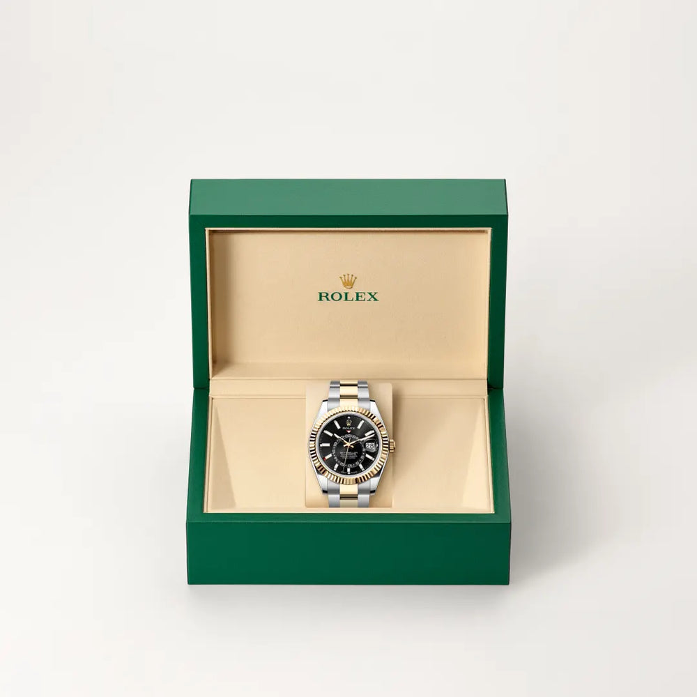 Rolex Sky-Dweller in Yellow Rolesor - combination of Oystersteel and yellow gold with a Bright black dial, Fluted, bidirectional rotatable Rolex Ring Command bezel, Oyster, three-piece solid links bracelet