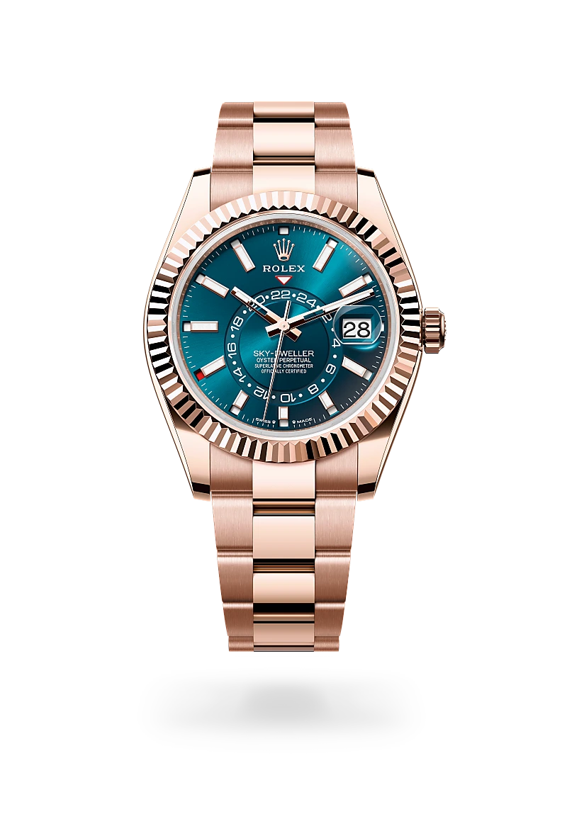 Rolex Sky-Dweller in 18 ct Everose gold with a Blue-green dial, Fluted, bidirectional rotatable Rolex Ring Command bezel, Oyster, three-piece solid links bracelet