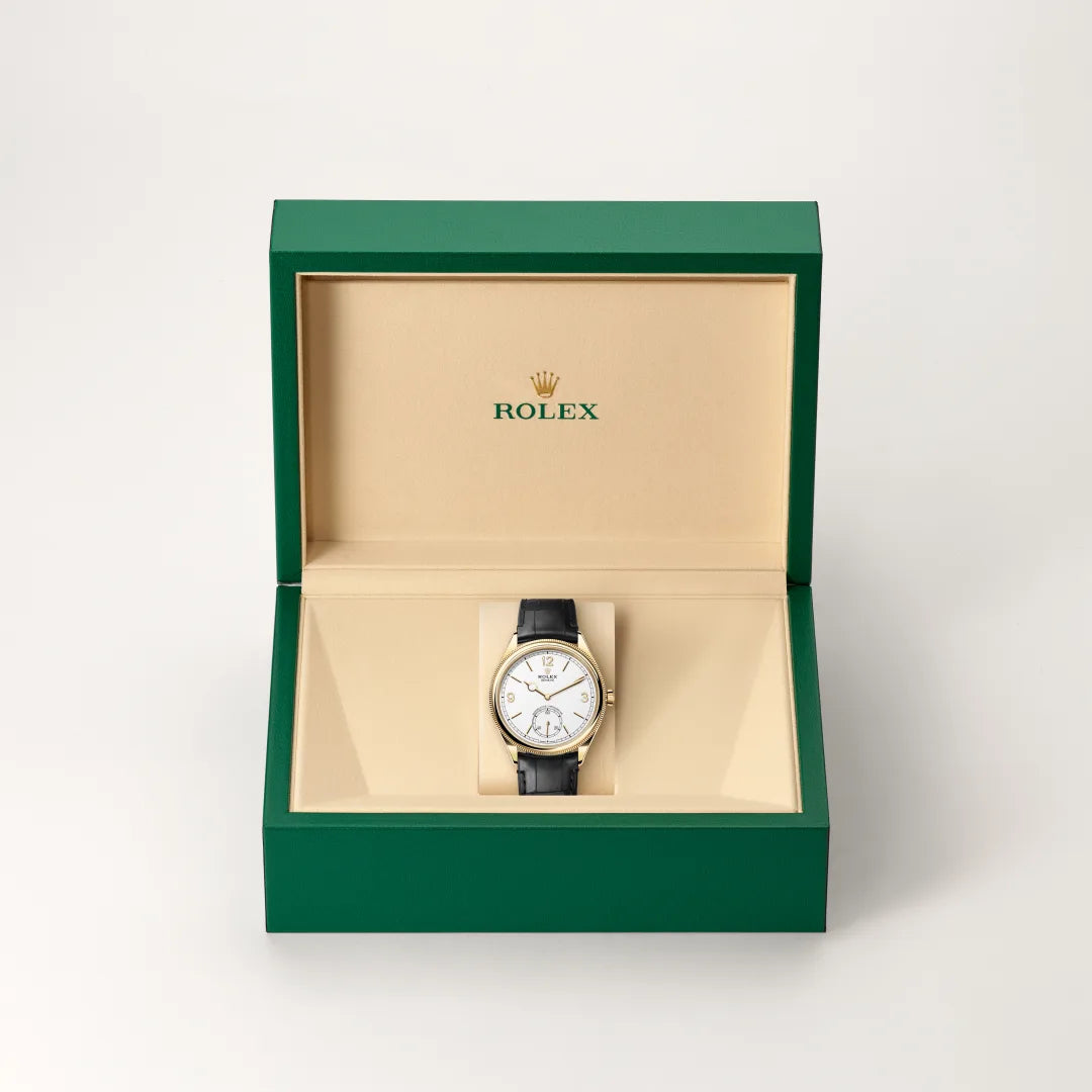 Rolex 1908 in 18 ct yellow gold with a Intense white dial, Domed and fluted bezel, Leather strap bracelet